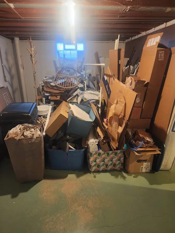 Roll-off dumpster container at job site for 20 Yard Dumpster Rental in Robinson